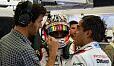 Juan Pablo Montoya berichtet Champion Mark Webber, wie er sich in dessen Auto fühlt - Foto: Porsche