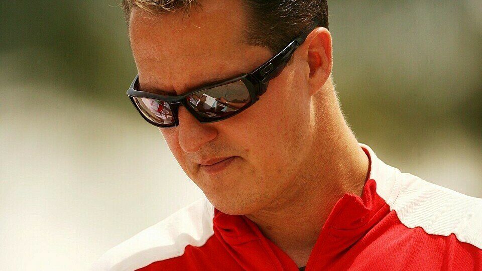 Die Bundeskanzlerin stärkt Schumacher den Rücken., Foto: Sutton