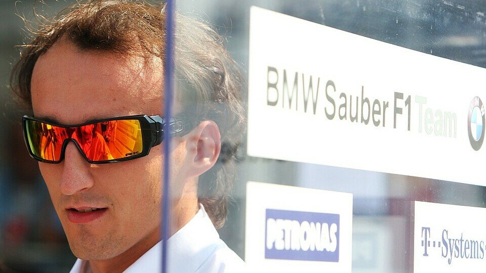 Robert Kubica glaubt an Jenson Button., Foto: Sutton