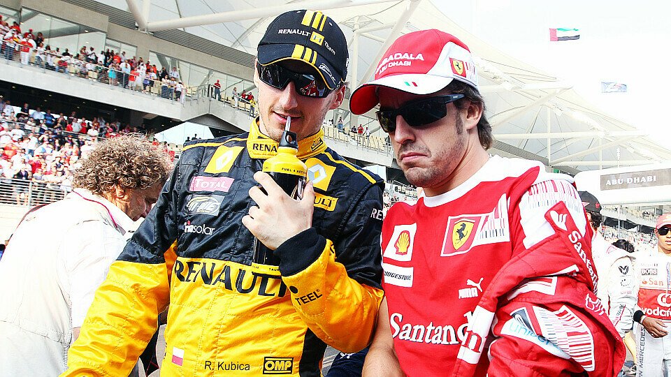 Robert Kubica mit Fernando Alonso beim F1-Finale 2010, zwei Jahre später hätten sie Teamkollegen sein können, Foto: Sutton
