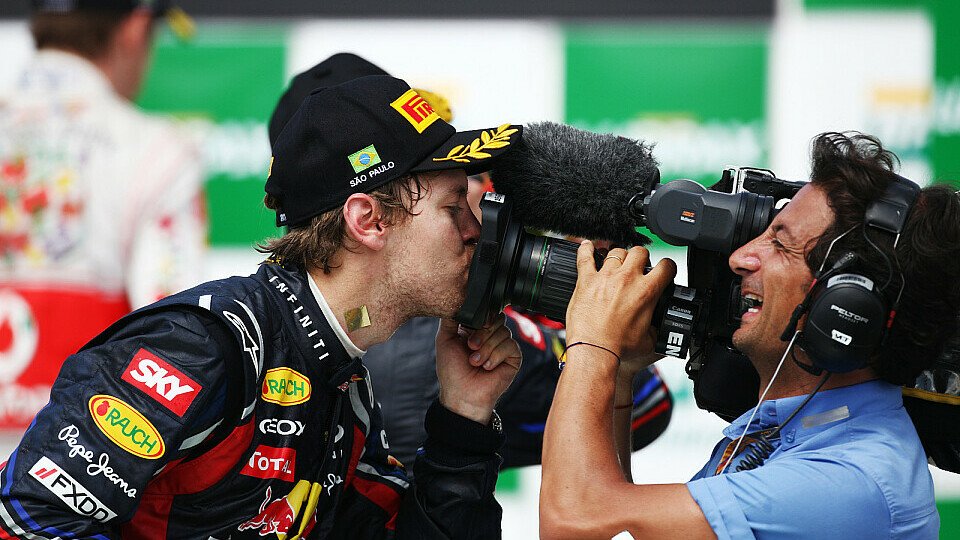 Sebastian Vettel: die Kameras lieben ihn - und andersherum, Foto: Sutton