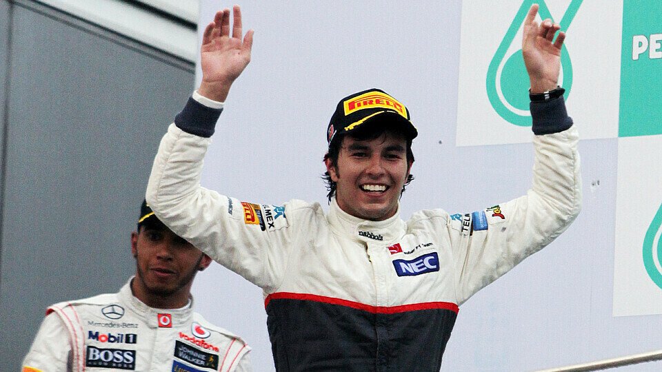 Sergio Perez strahlte nach seinem ersten Formel-1-Podest, Foto: Sutton