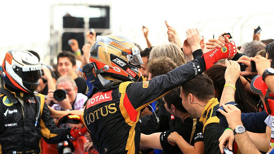 Romain Grosjean feiert sein erstes Podium in der F1, Foto: Sutton