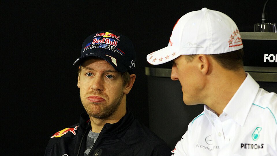 Sebastian Vettel und Michael Schumacher beim Großen Preis von Brasilien 2012, Foto: Sutton