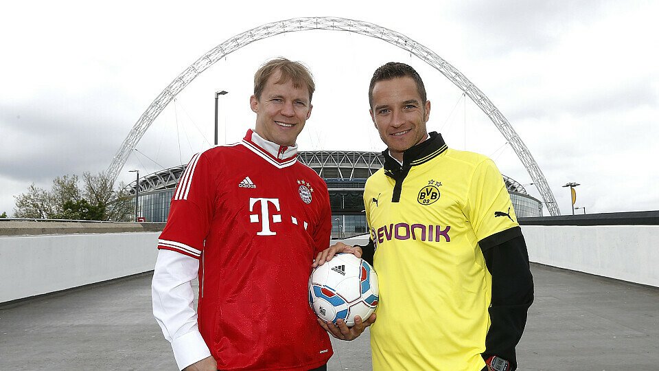 Gipfeltreffen in Wembley: Timo Scheider unterstützt Borussia Dortmund - Mattias Ekström den FC Bayern, Foto: Audi