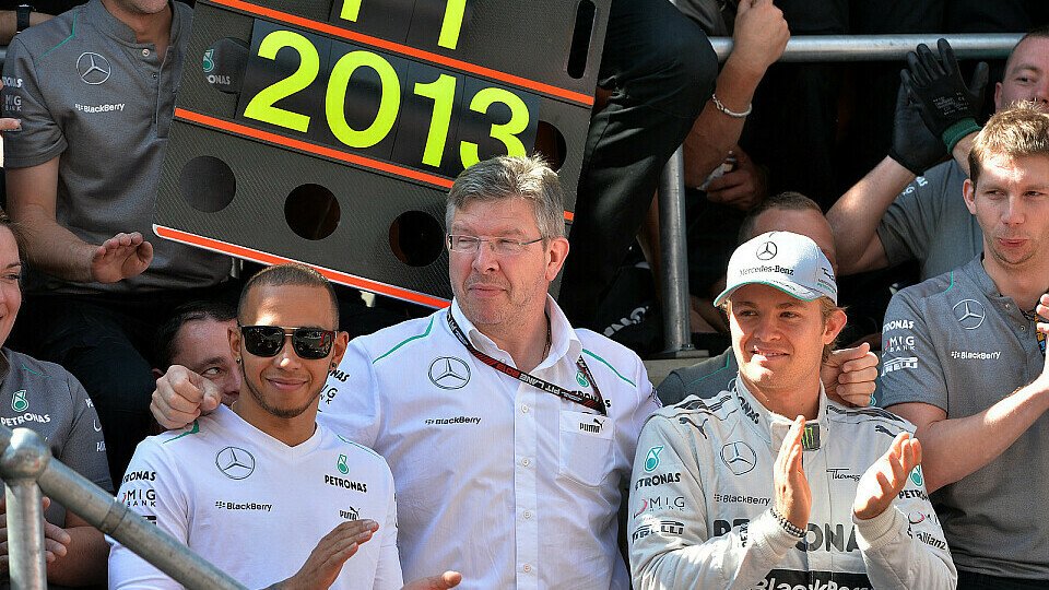Hamilton und Rosberg mit ihrem ehemaligen Teamchef Ross Brawn, Foto: Sutton