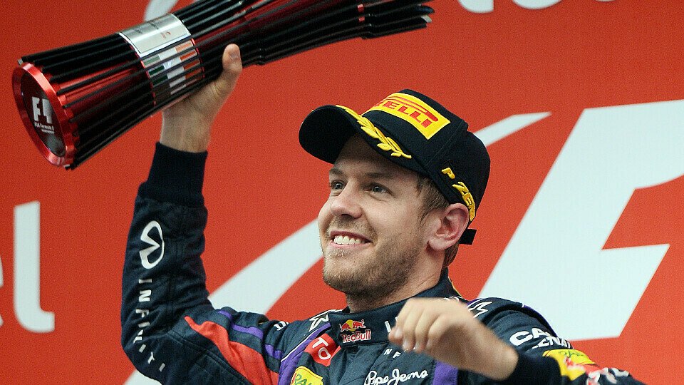 Sebastian Vettel auf dem Podium: 122 mal platzierte er sich in den Top-3., Foto: Sutton