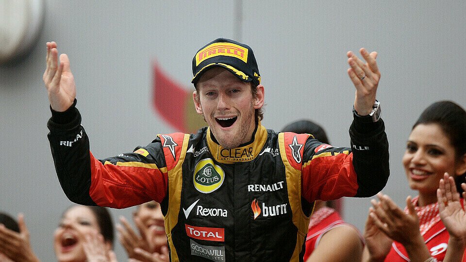 Auch Romain Grosjean durfte auf dem Weltmeister-Podium stehen, Foto: Sutton