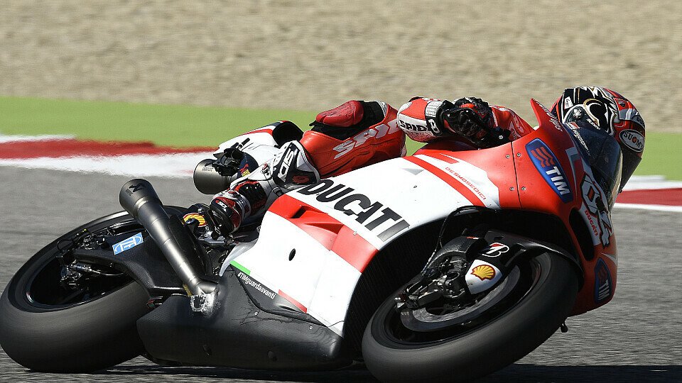 Andrea Dovizioso löst seinen Landsmann und Markenkollegen an der Trainingsspitze ab, Foto: Ducati
