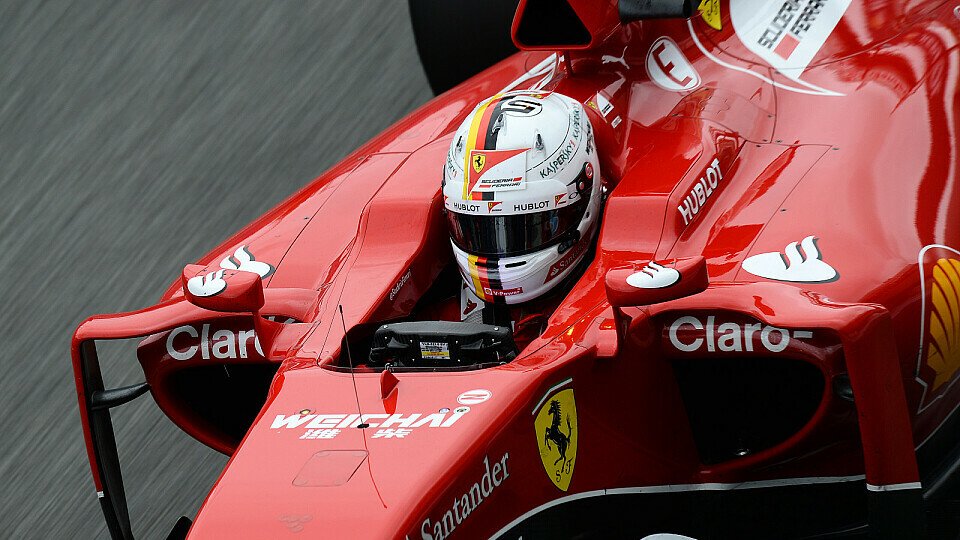 Die Fans können sich an den weißen Helm von Sebastian Vettel gewöhnen., Foto: Sutton