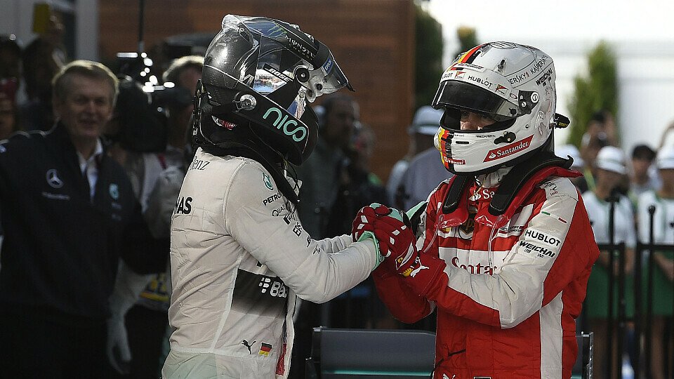 Nico Rosberg und Sebastian Vettel hatten einiges zu besprechen, Foto: Ferrari