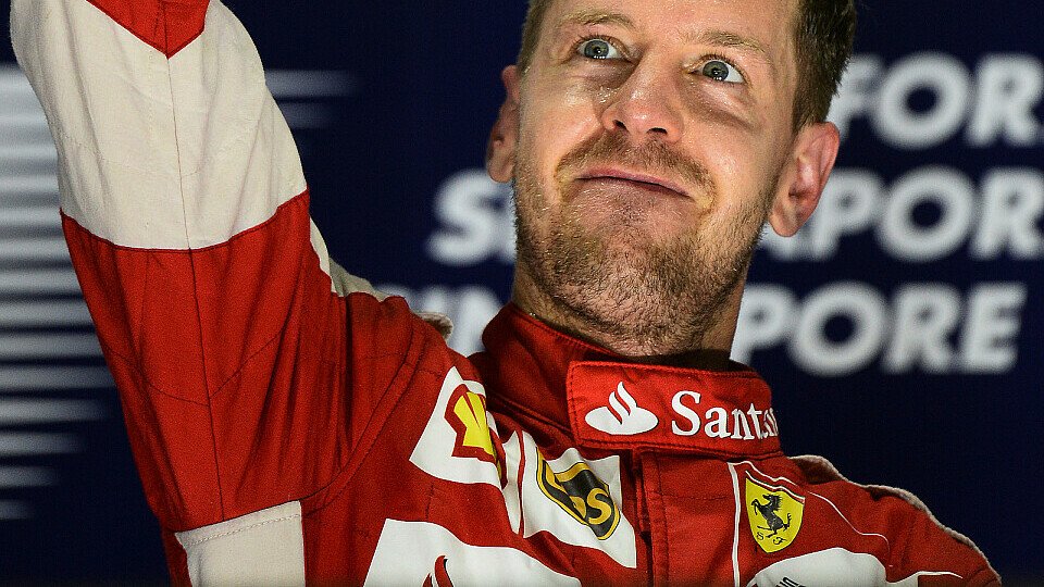 Vettel jubelt über seinen dritten Streich, Foto: Sutton