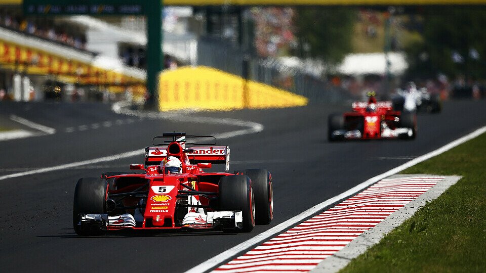 Sebastian Vettel gewinnt den Ungarn GP vor Ferrari-Kollege Kimi Räikkönen, Foto: LAT Images