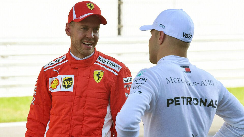 Eine halbe Sekunde Rückstand und dennoch bester Laune: Sebastian Vettel nach dem Russland-Qualifying, Foto: Sutton