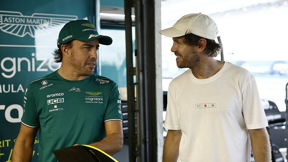 Fernando Alonso mit Sebastian Vettel in der Aston Martin-Box