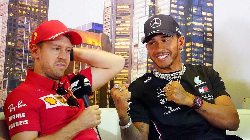 Sebastian Vettel und Lewis Hamilton sprechen in einer F1-Pressekonferenz