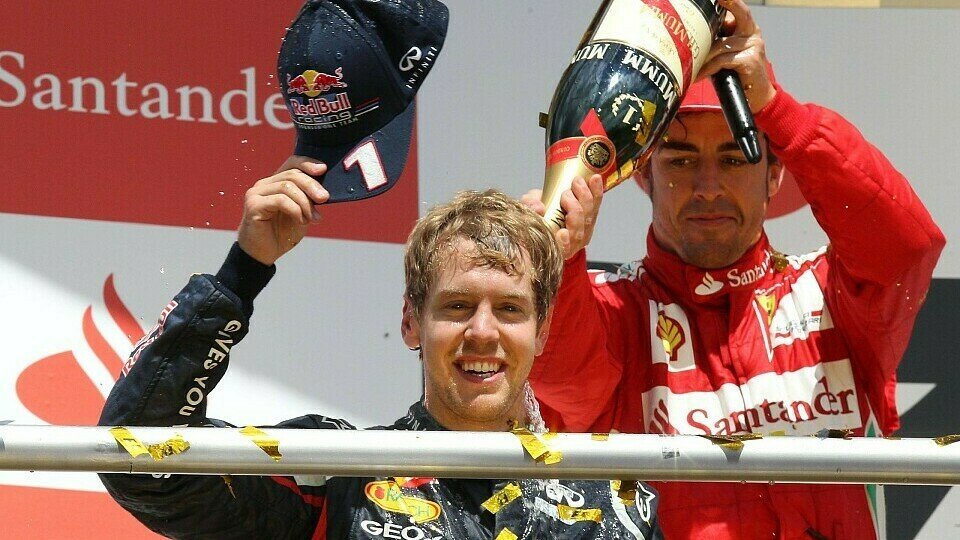 Fernando Alonso (Ferrari) und Sebastian Vettel (Red Bull) auf dem Formel-1-Podium beim Deutschland-GP 2012 (Hockenheim)