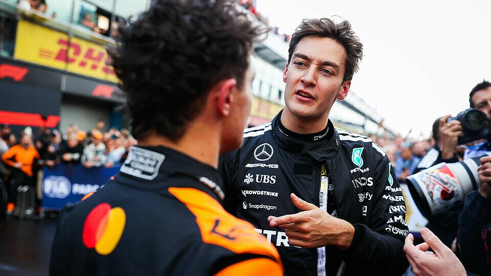 George Russell spricht mit Lando Norris