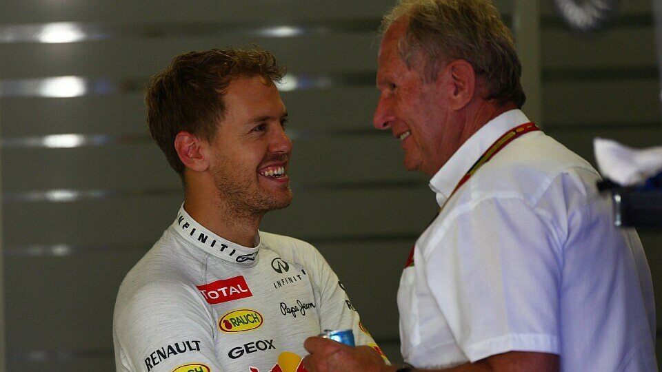 Sebastian Vettel im Gespräch mit Helmut Marko