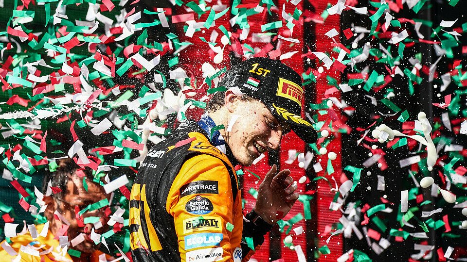 Oscar Piastri im Konfetti-Meer auf dem Podium beim Großen Preis von Ungarn 2024