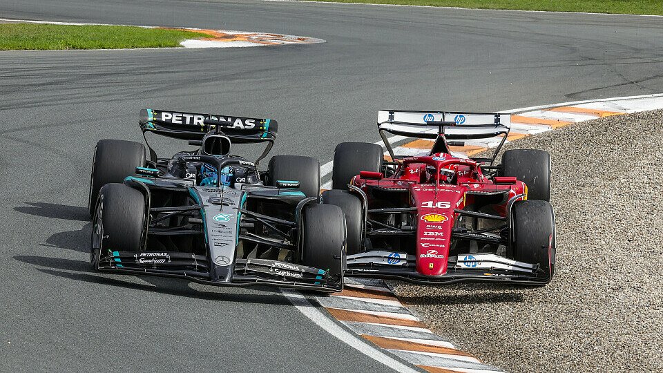 George Russell wird in der Schikane in Zandvoort von Charles Leclerc überholt