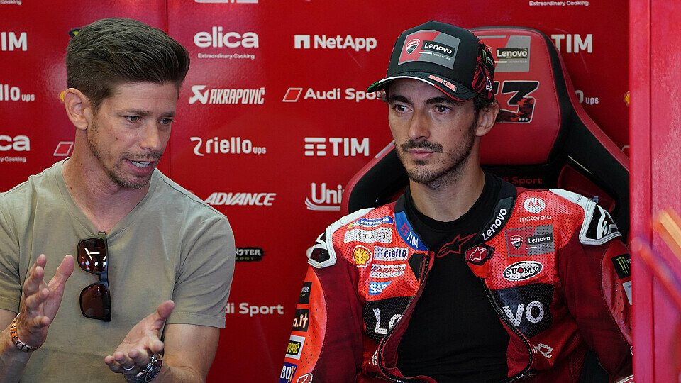 Francesco Bagnaia und Casey Stoner in der Ducati-Box Francesco Bagnaia und Casey Stoner in der Ducati-Box